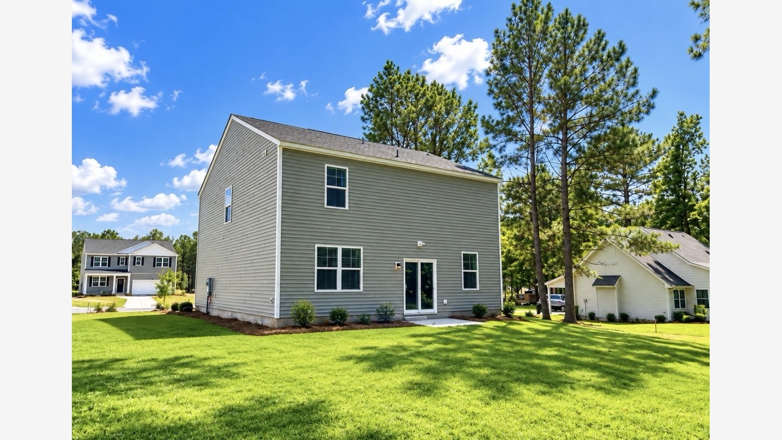 Belhaven C rear exterior with large backyard in cypress landing community in hardeeville sc