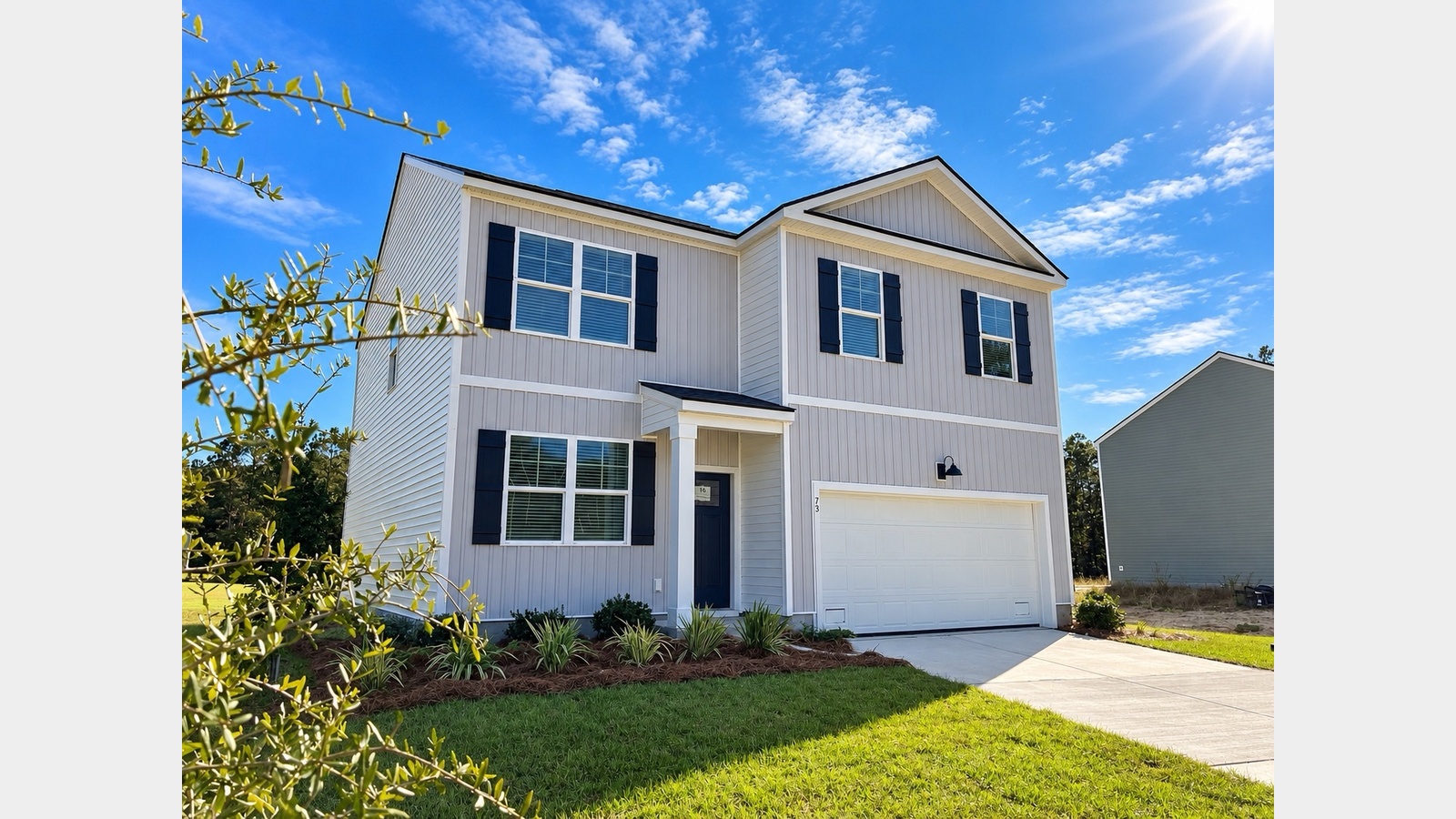 Additional Side angle of front exterior of Belhaven C with large yard and beautiful streetscape
