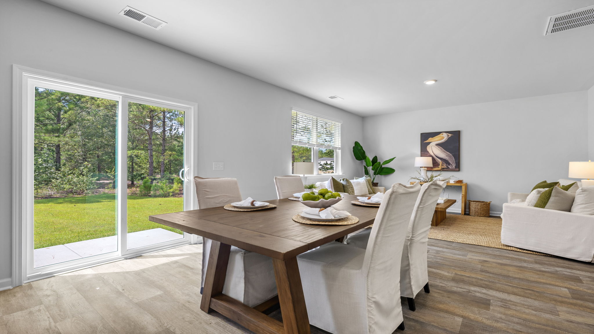 Open dining room featuring natural light