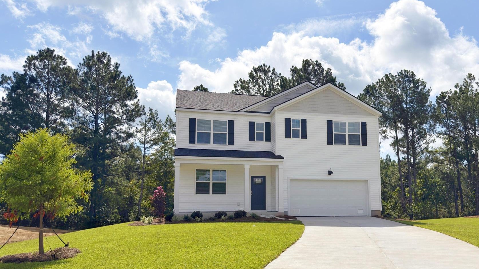 front of home hayden floor plan in cypress landing community of hardeeville south carolina large yard