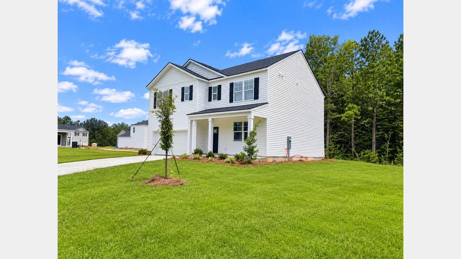 Hayden B Front side view of home in cypress landing community in hardeeville, sc