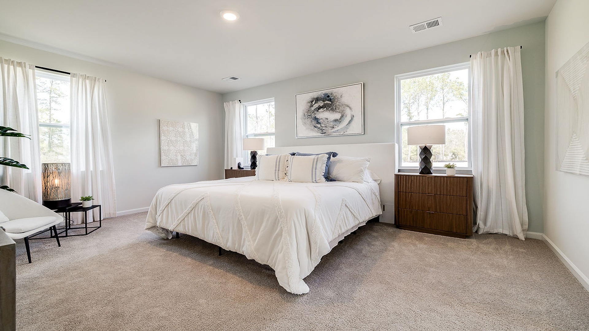 Primary bedroom with a bed