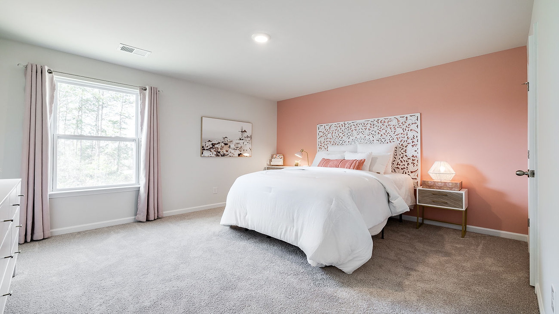 Guest bedroom with a bed