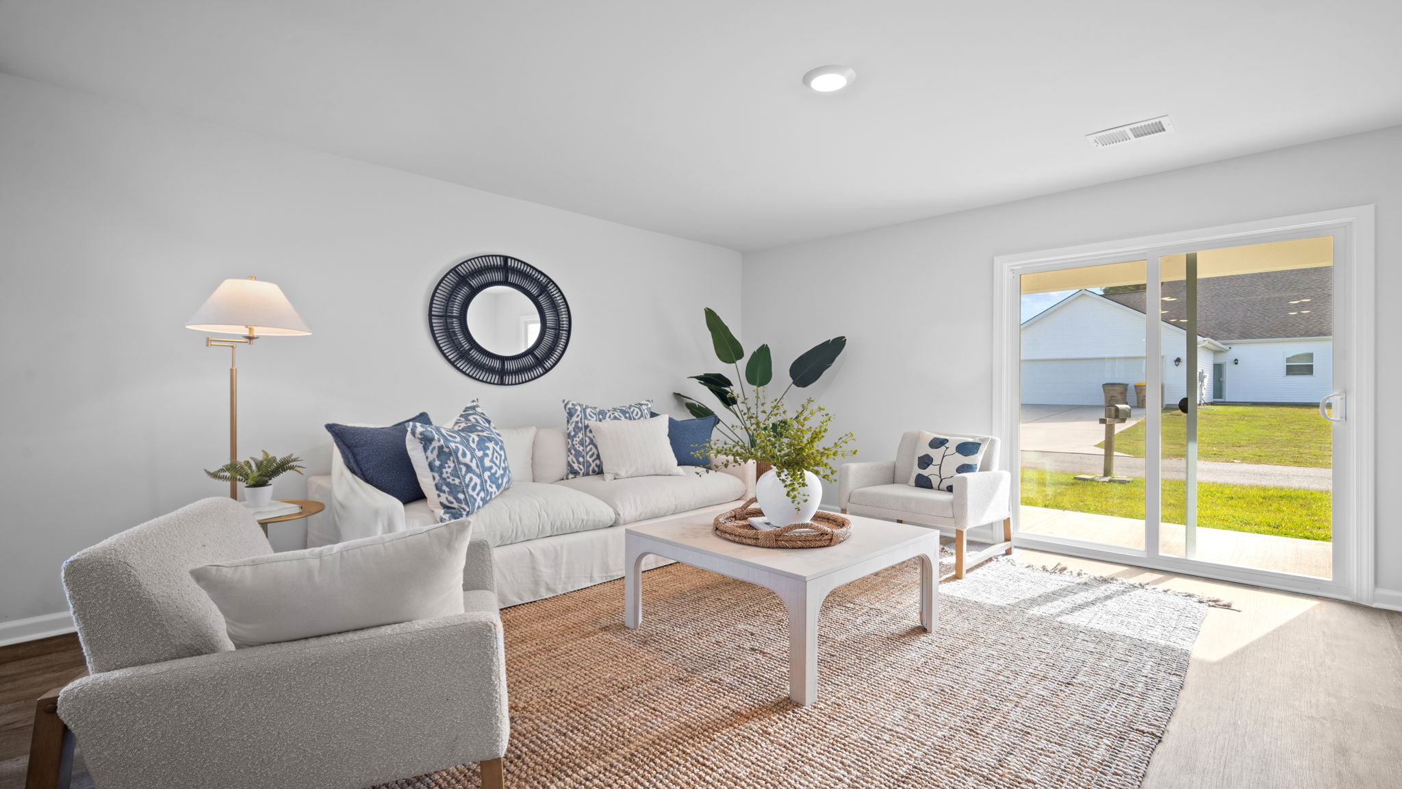 Living room decorated with seating and tables
