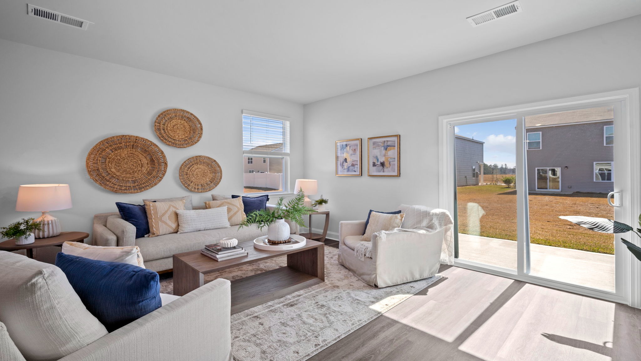 Living room of home decorated with a couch, tables and seating
