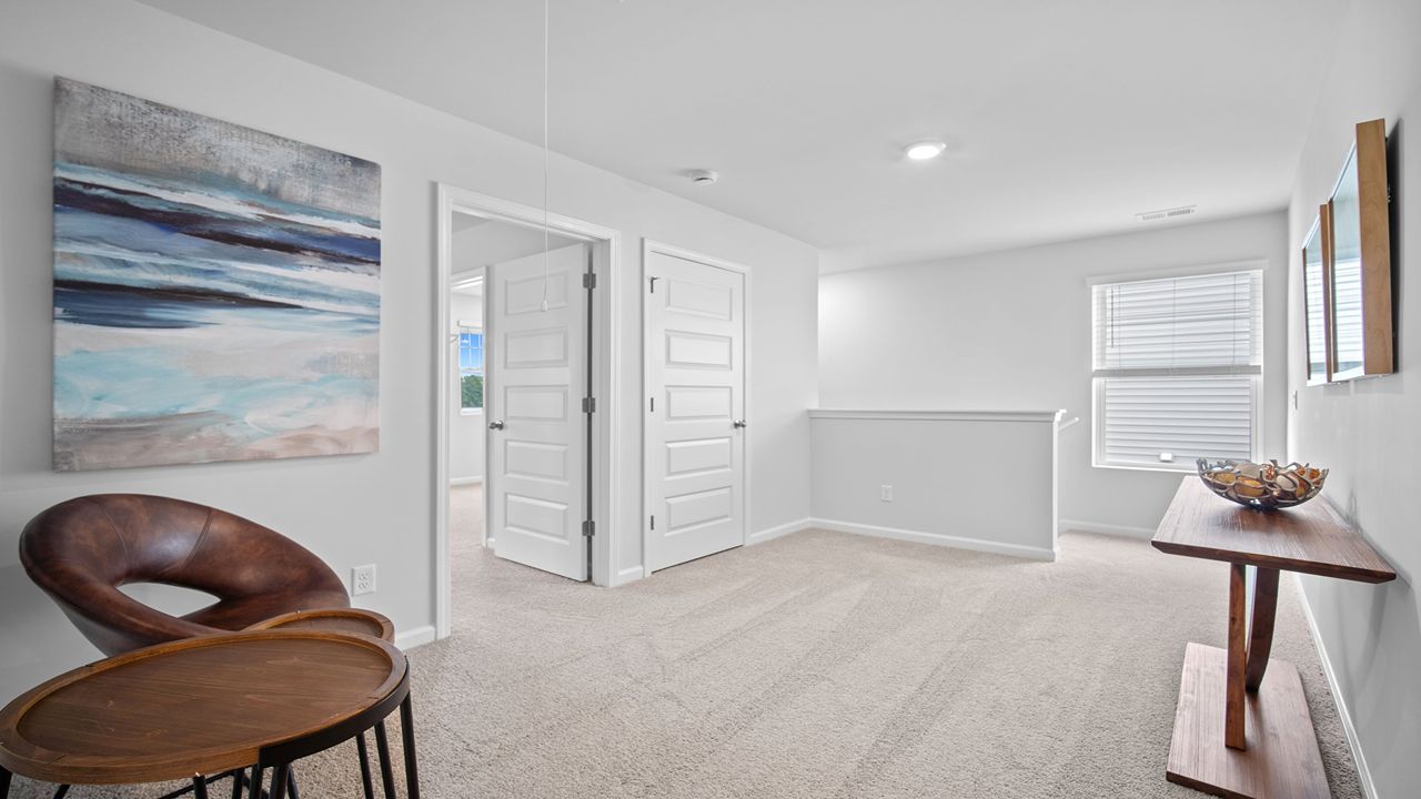 Loft area with seating and open layout.