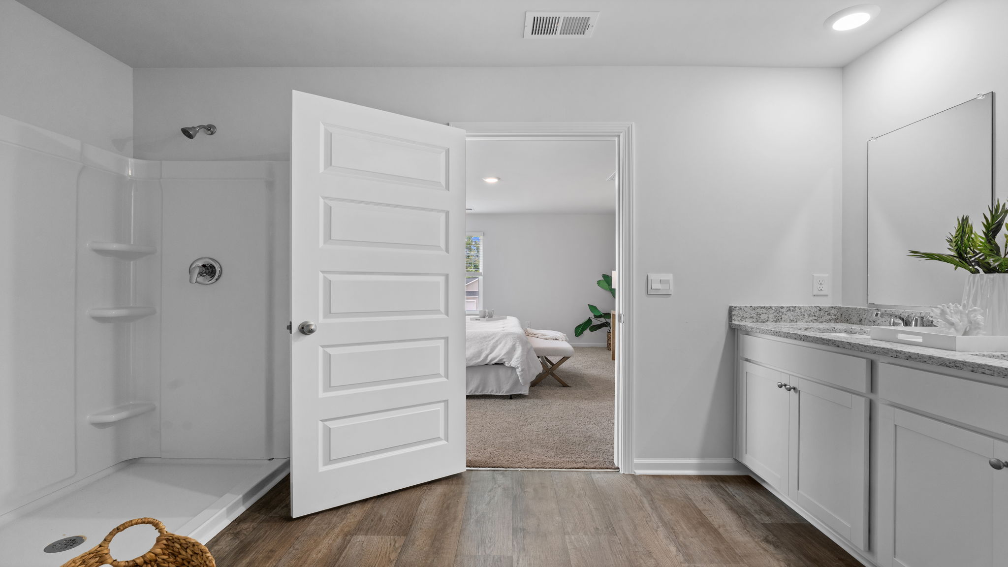Beautiful primary bath in the Downing floor plan by D.R. Horton featuring premium finishes, spacious countertops, and a relaxing atmosphere inspired by luxury living.