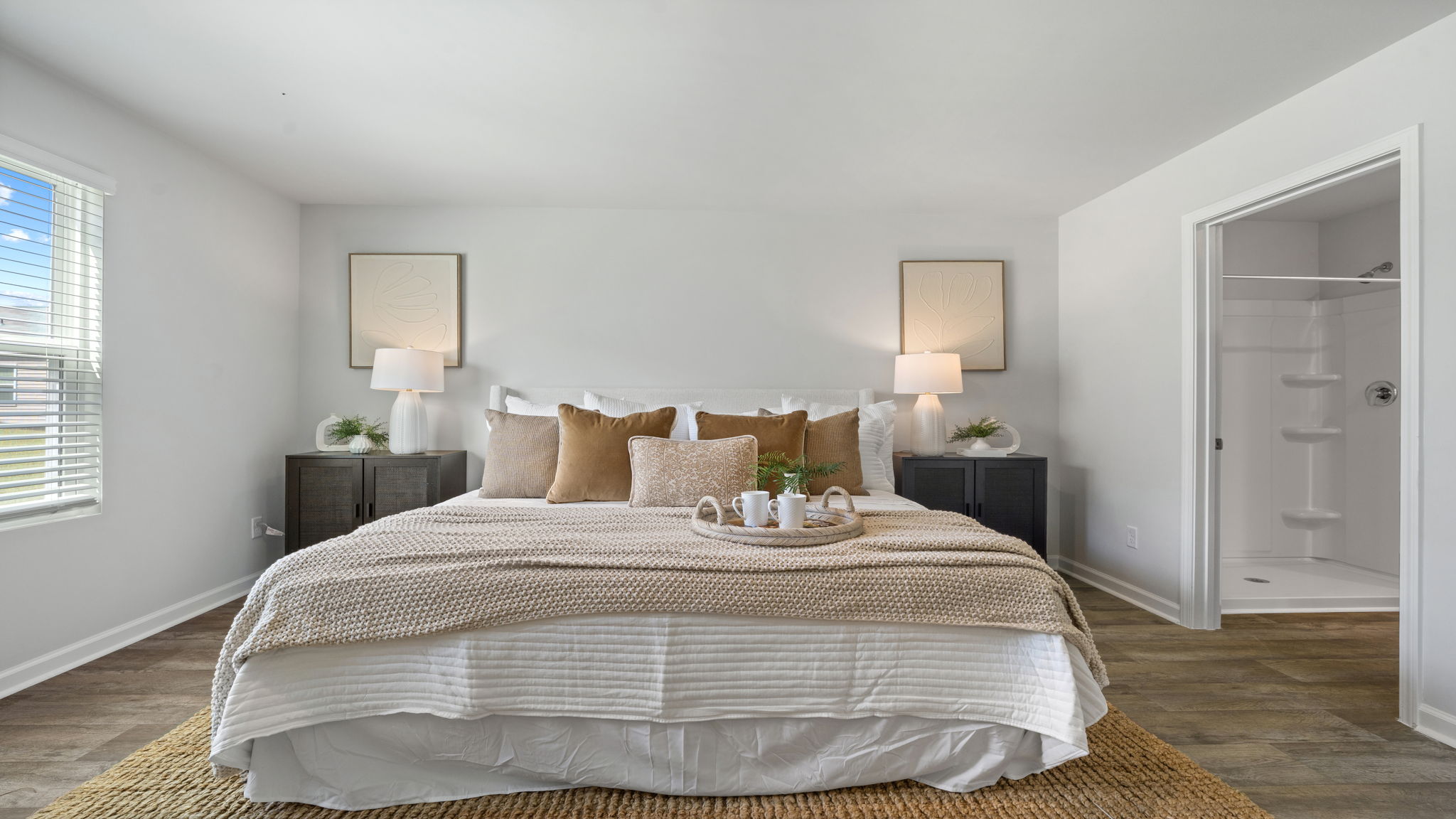 Allex A Primary Bedroom | Spacious primary suite with large windows and comfortable layout.