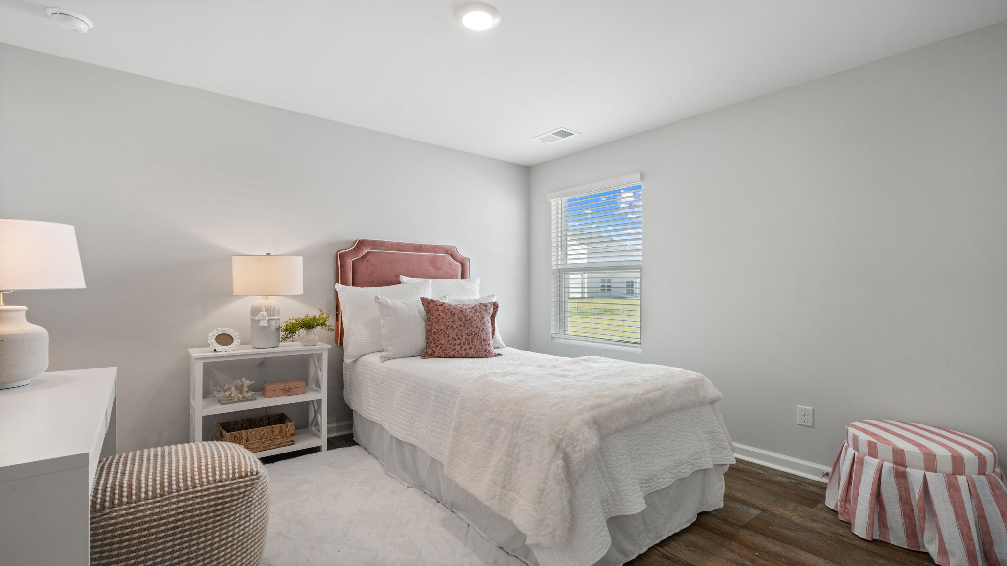 Allex A Secondary Bedroom | Versatile secondary bedroom suitable for guests or family members.