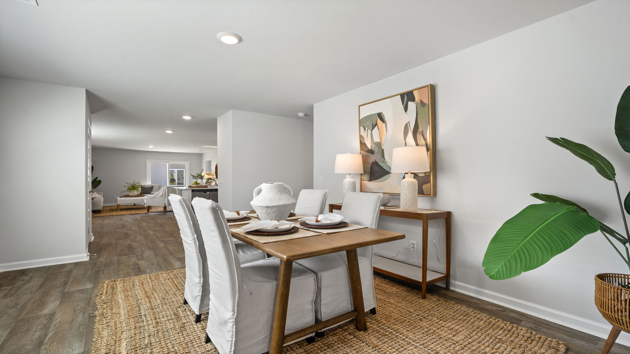Allex A Dining to Kitchen View | Dining area with direct access to the kitchen and gathering spaces.