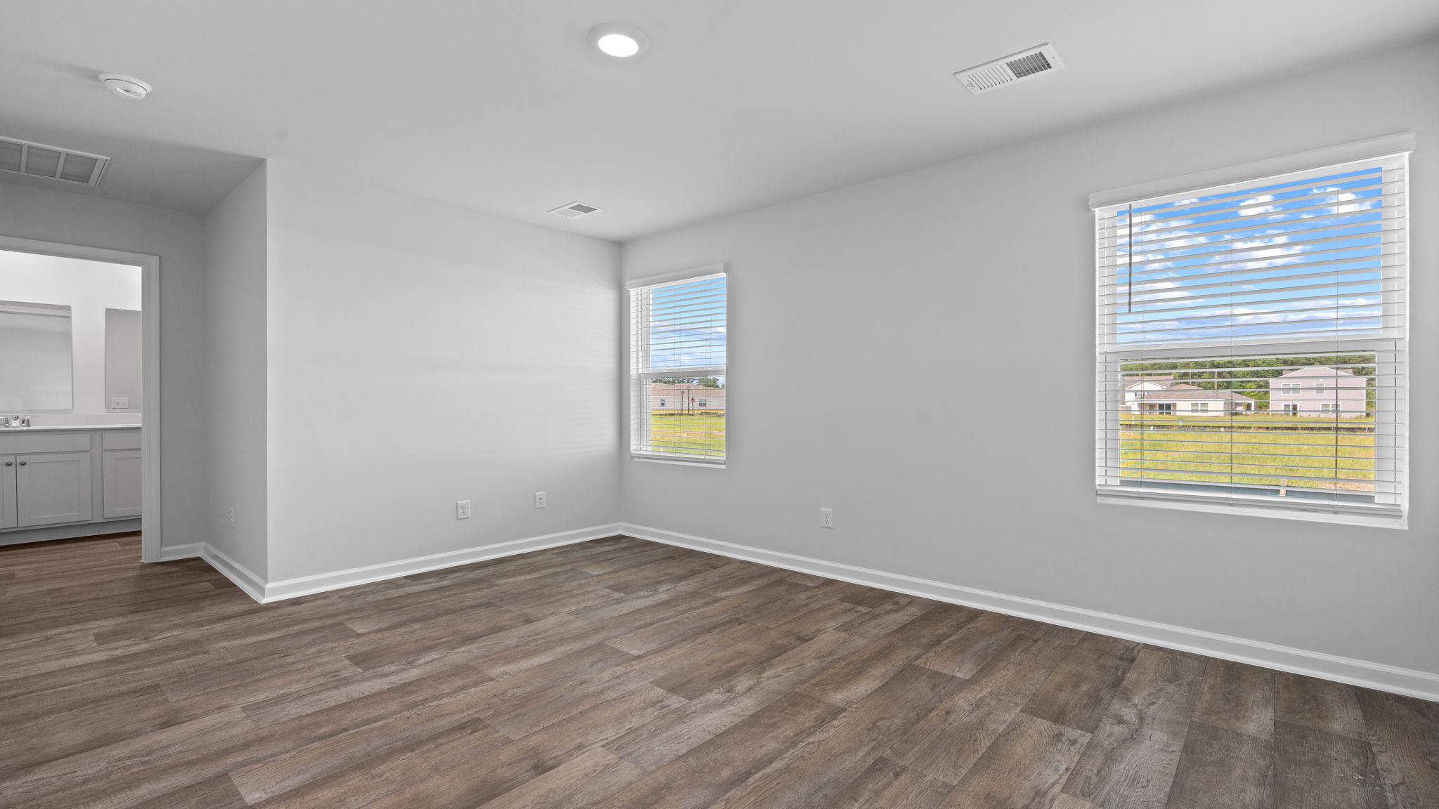Spacious primary suite in the Willow offering a private retreat within this thoughtfully designed home.