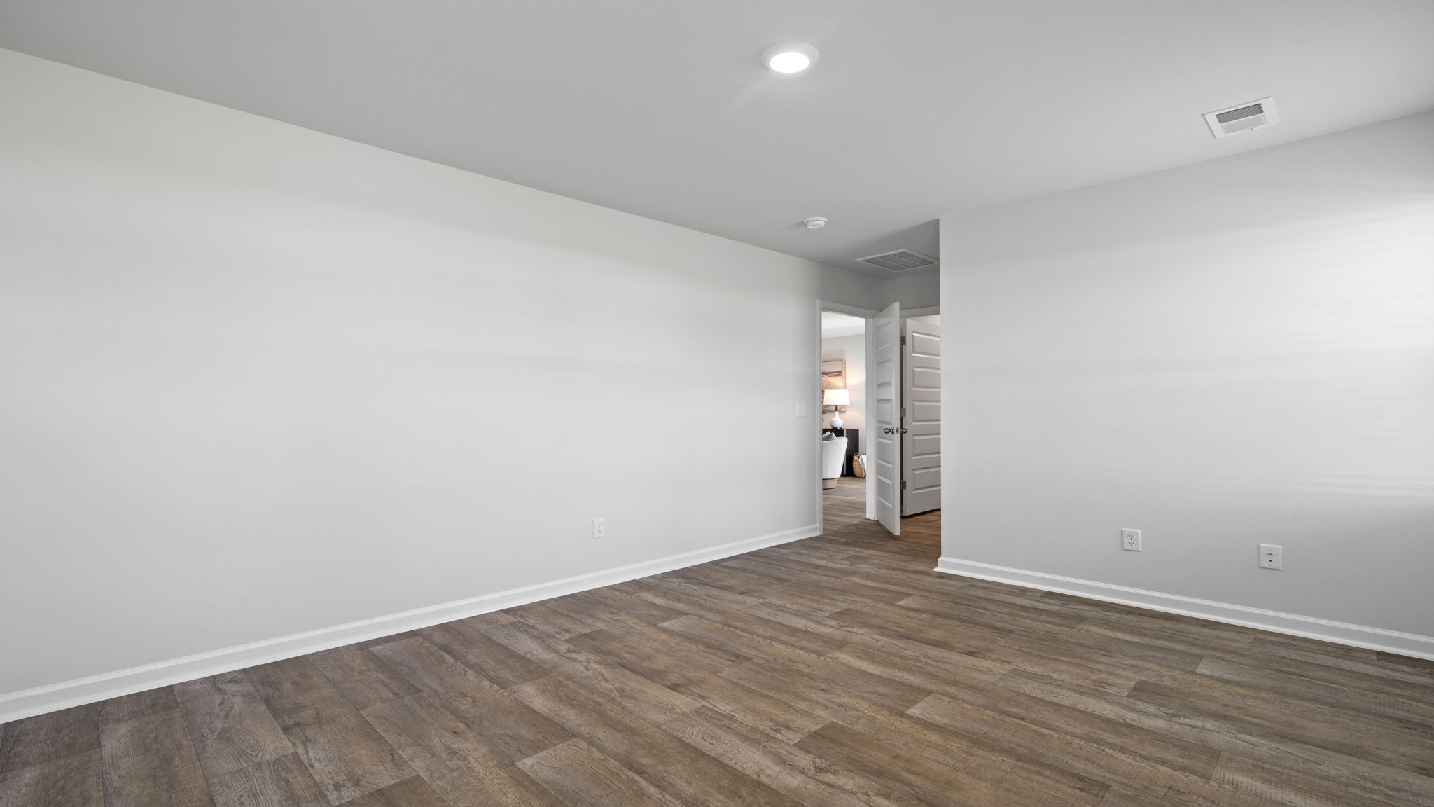 Owner's suite in the Willow by D.R. Horton featuring comfort, privacy, and functional design.