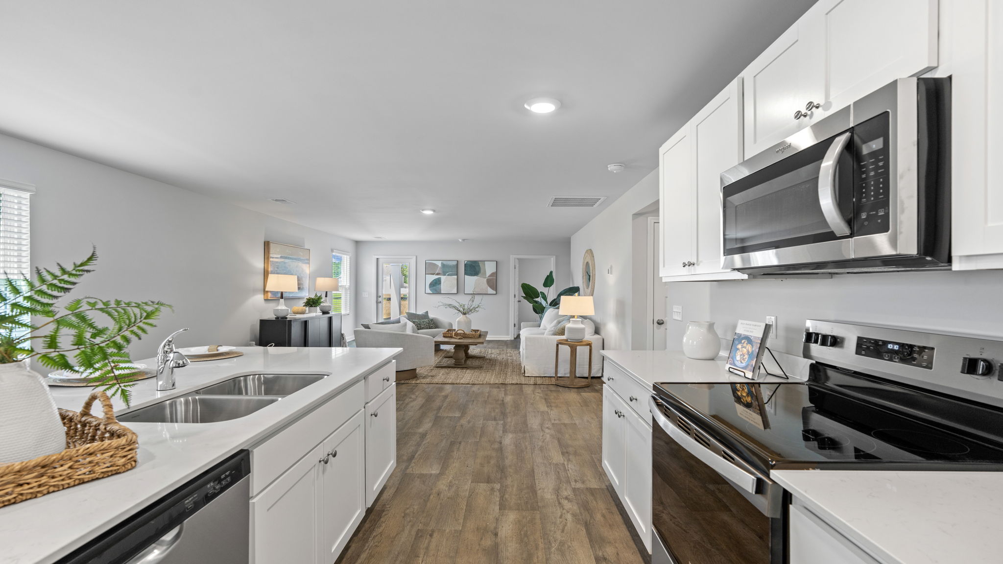 Open kitchen design in the Willow floor plan creating a seamless flow for entertaining and everyday living.