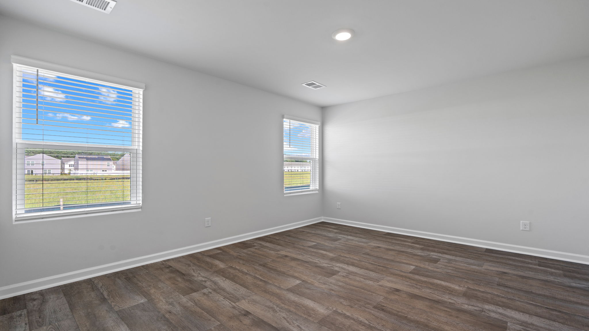 Private primary bedroom suite in the Willow by D.R. Horton designed for comfort and everyday living.
