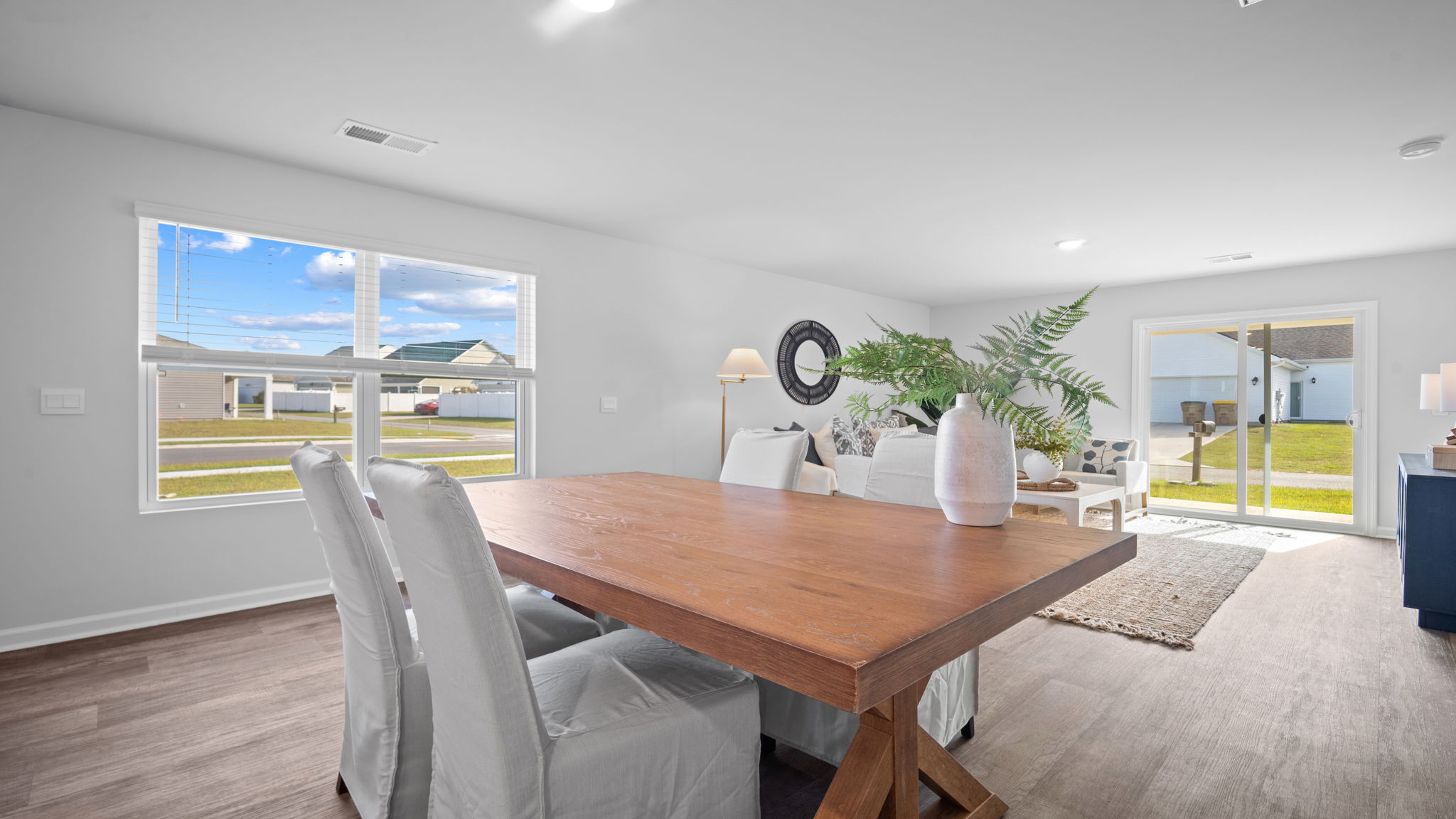 Alternate dining room view with table and natural light.