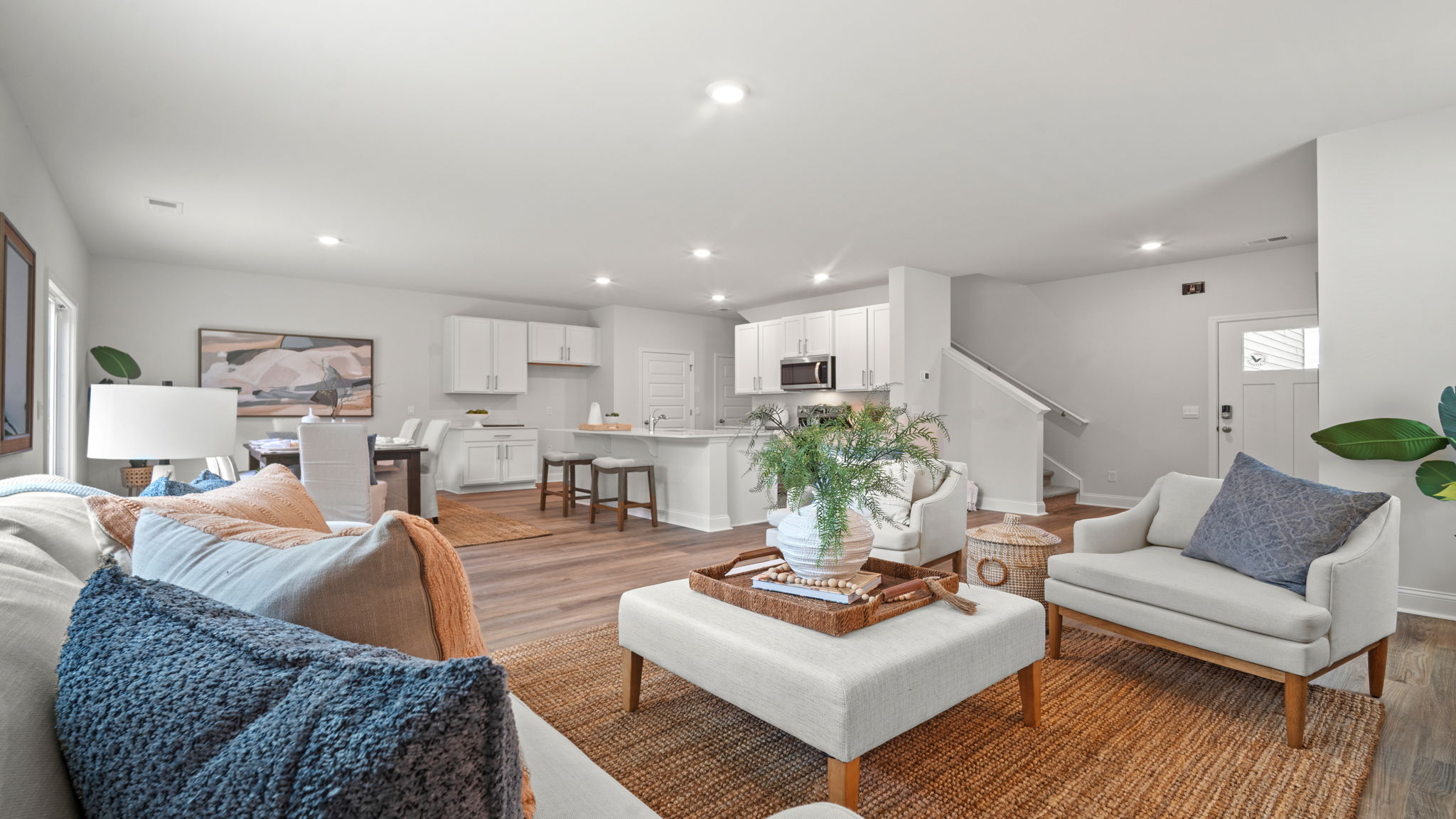 Open floor plan of the living, kitchen, and dining area. and dining area.