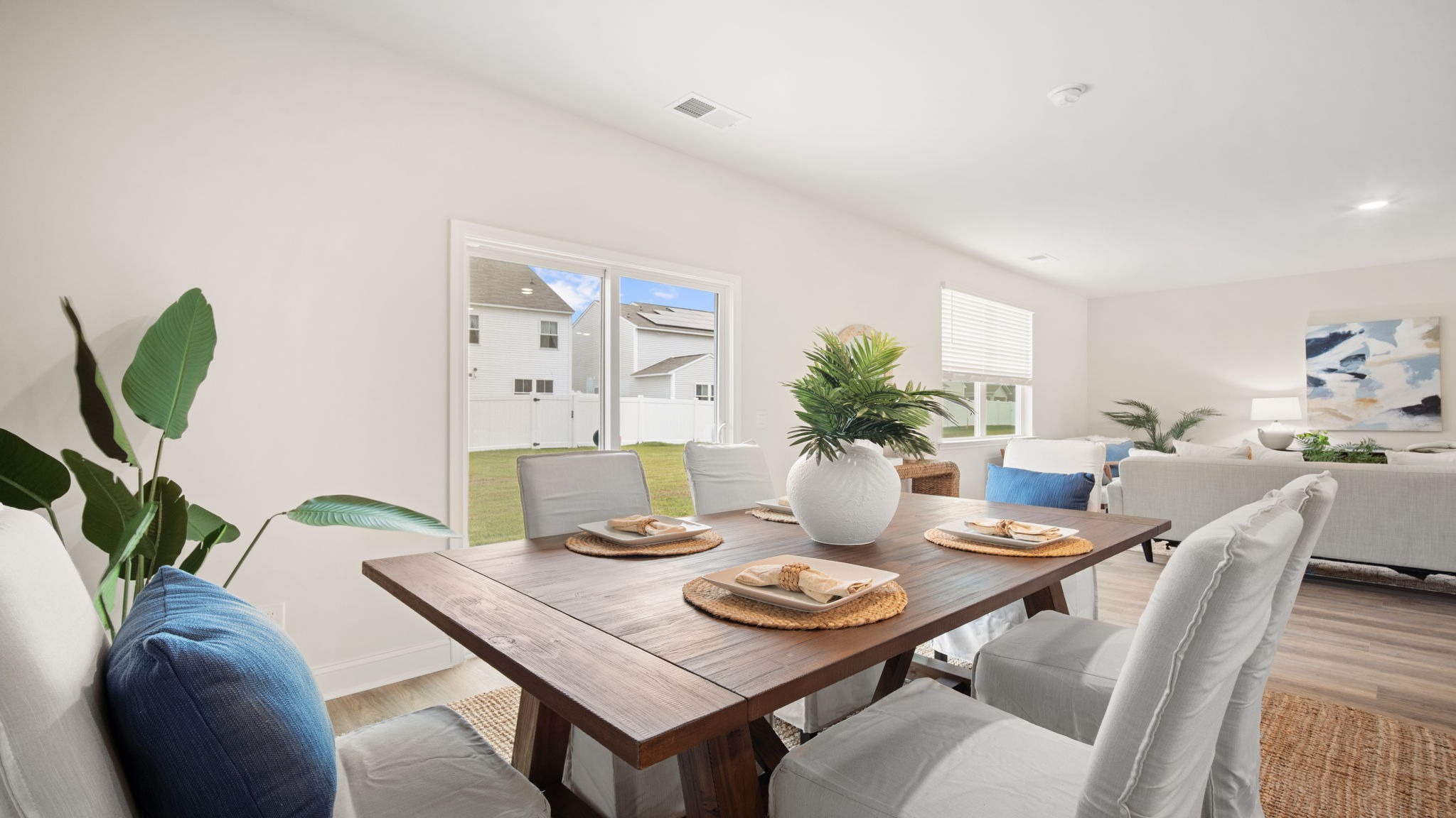 Dining area in the Belhaven floorplan by D.R. Horton featuring natural light, modern finishes, and convenient access to the kitchen for effortless entertaining.