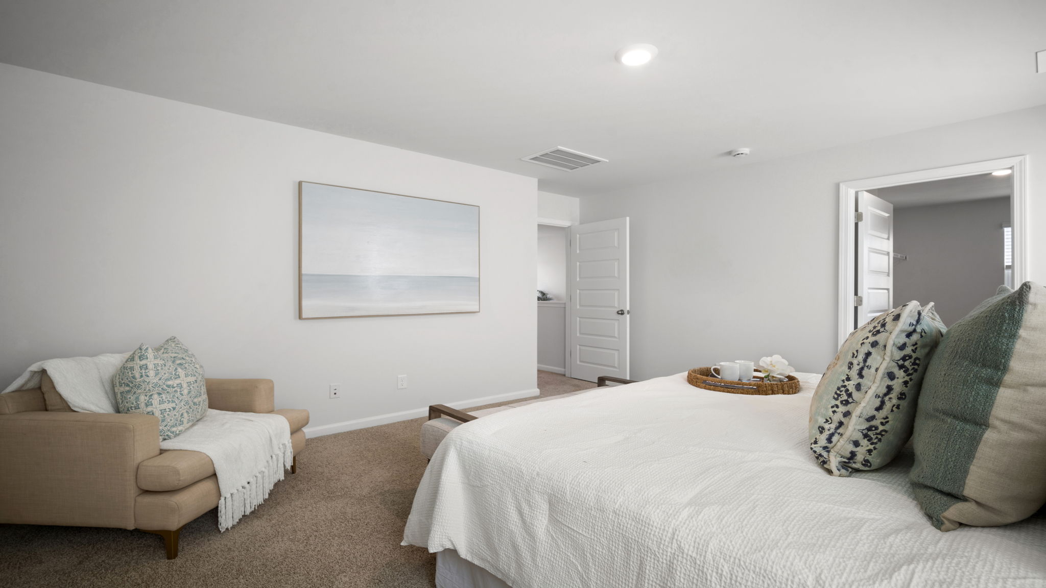 Primary bedroom layout with natural light.