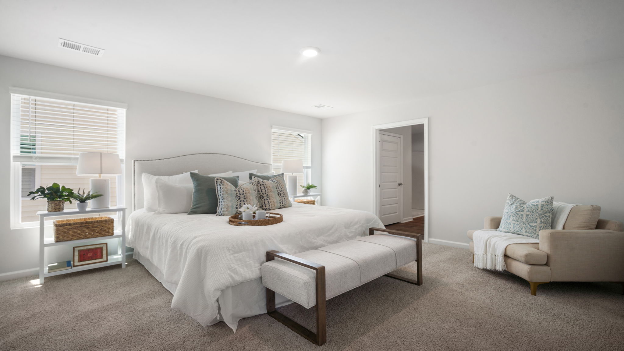 Private primary suite in the Elston floorplan featuring a spacious layout, relaxing atmosphere, and thoughtfully designed owner's retreat.