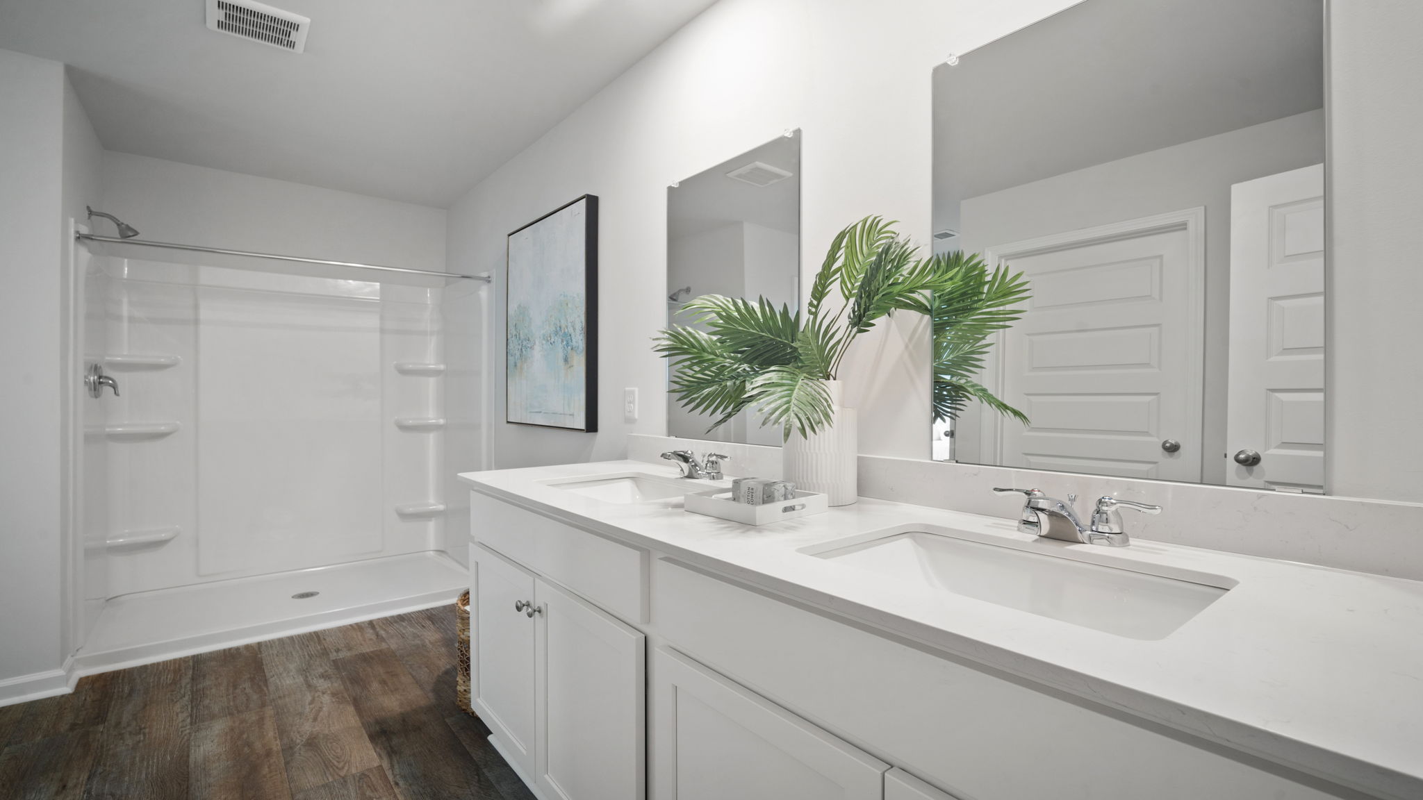 Spa-inspired primary bathroom in the Elston floorplan featuring modern fixtures, dual vanity space, and elegant finishes designed for comfort and convenience.