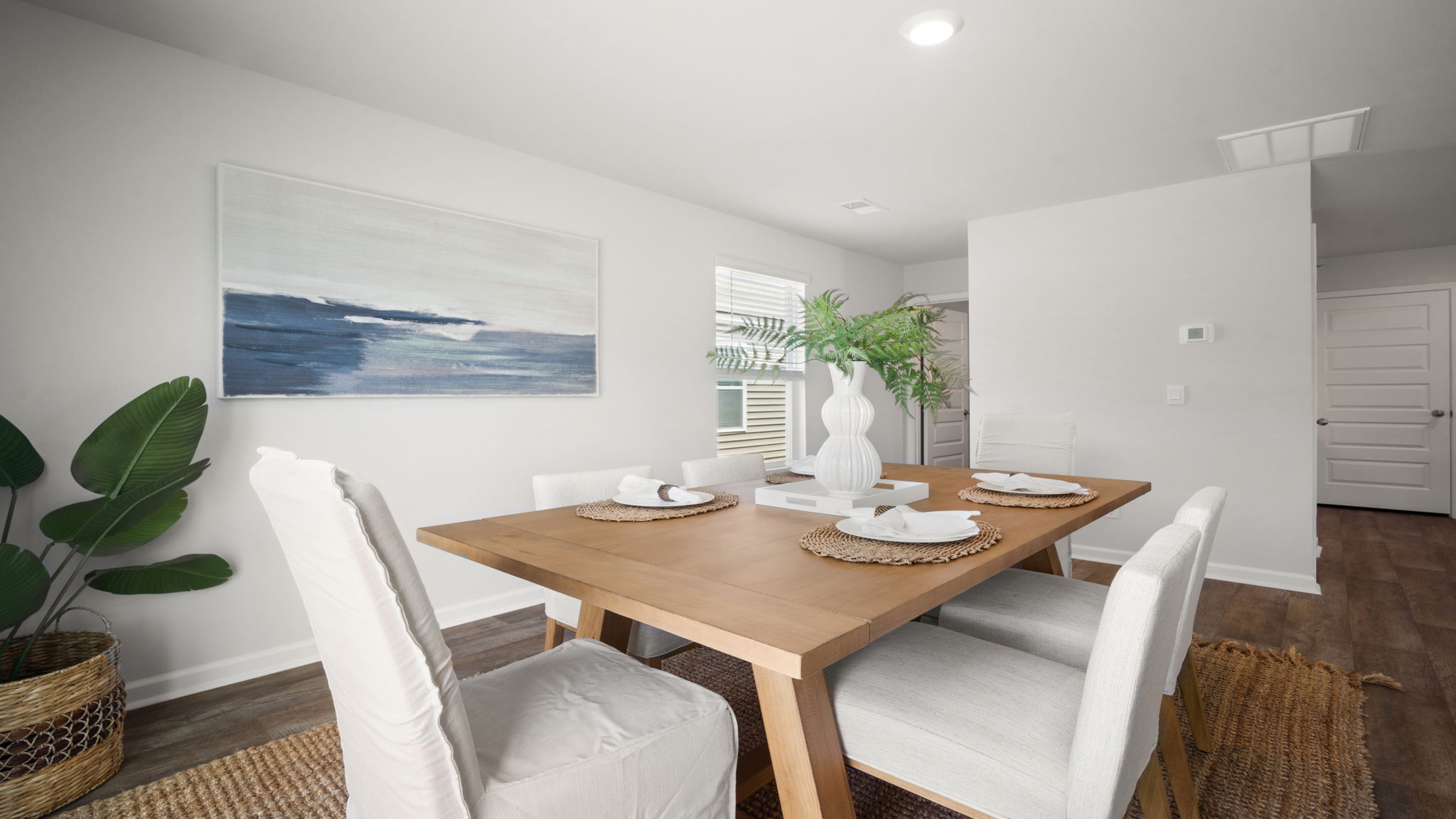 Open floor plan of the living, kitchen, and dining area. and dining area.