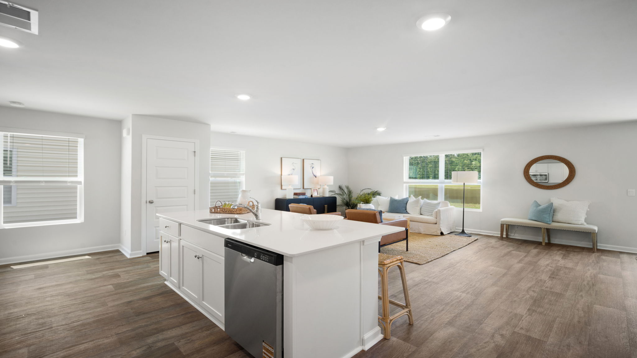 Kitchen island view of the living and dining area