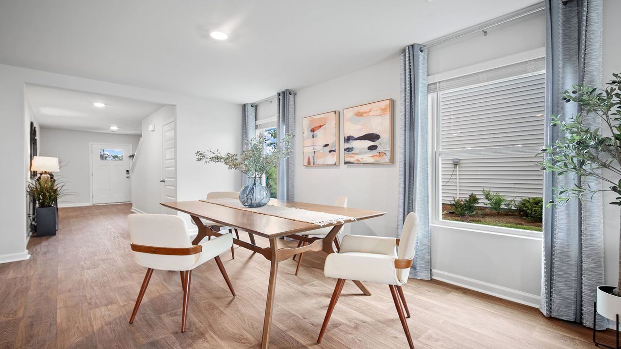 Dining area of home with a table and chairs