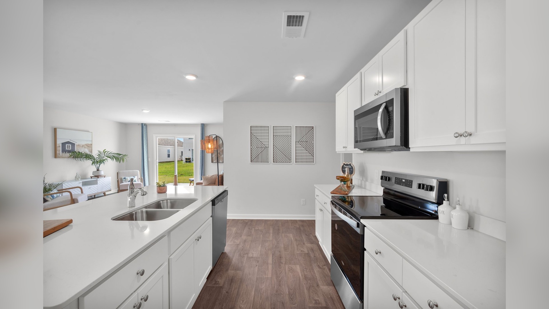 Kitchen walkway with counters on both sies