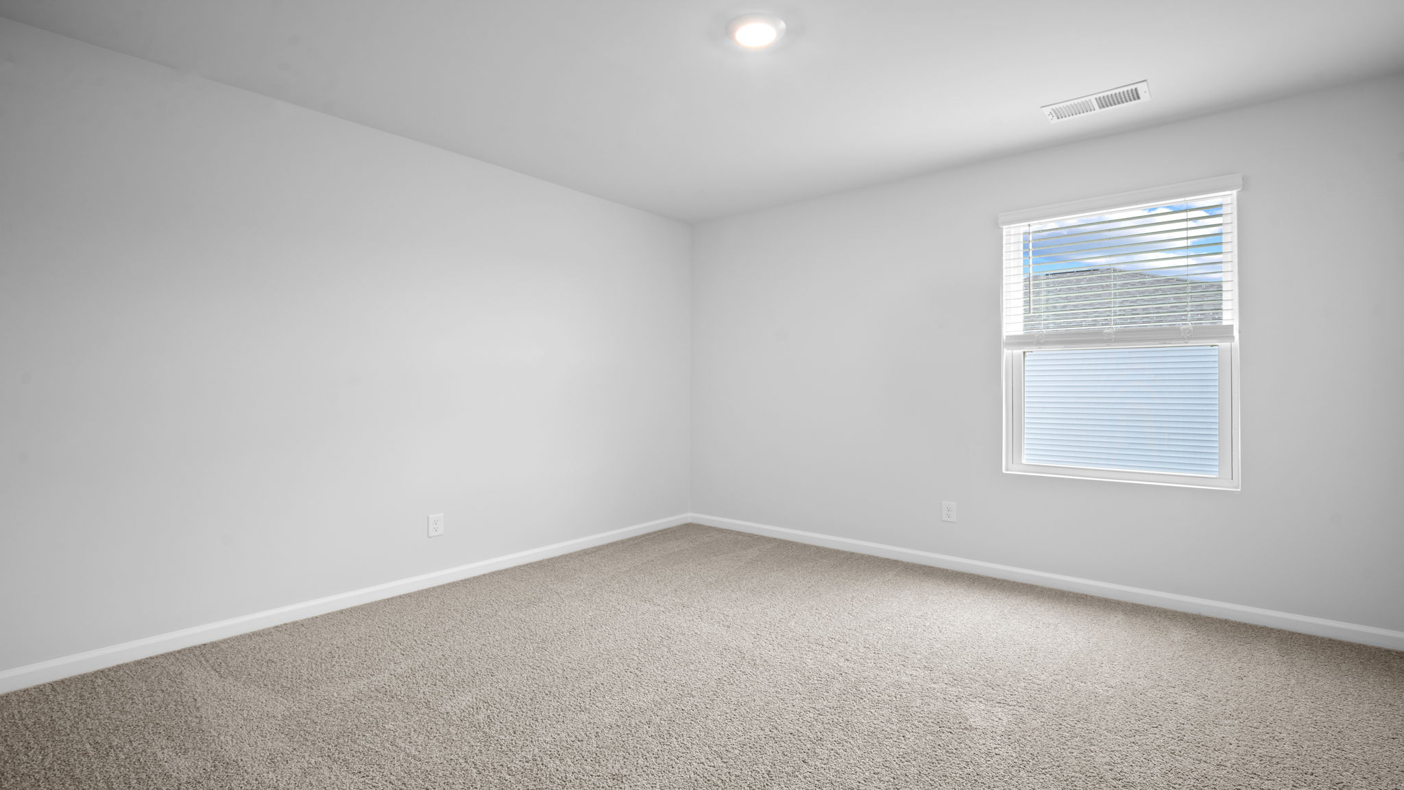 Secondary bedrooms in Robie floorplan ideal for family, guests, or home office use