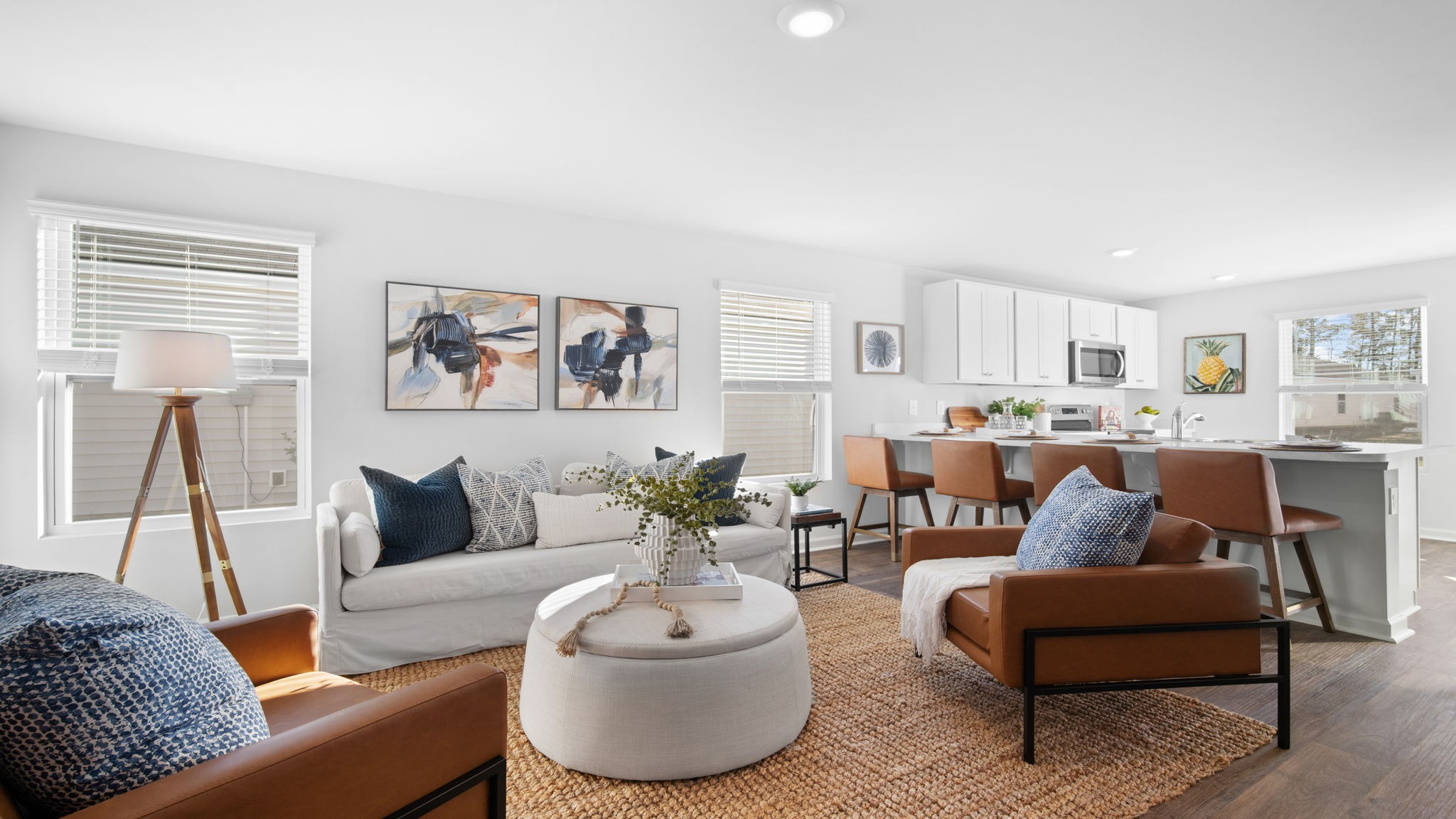Living area of home decorated with seating and tables