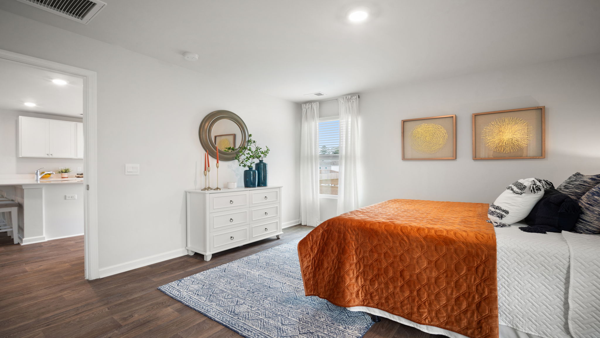 Private primary suite in Lewis floorplan with comfortable layout and natural light in Rice Hope