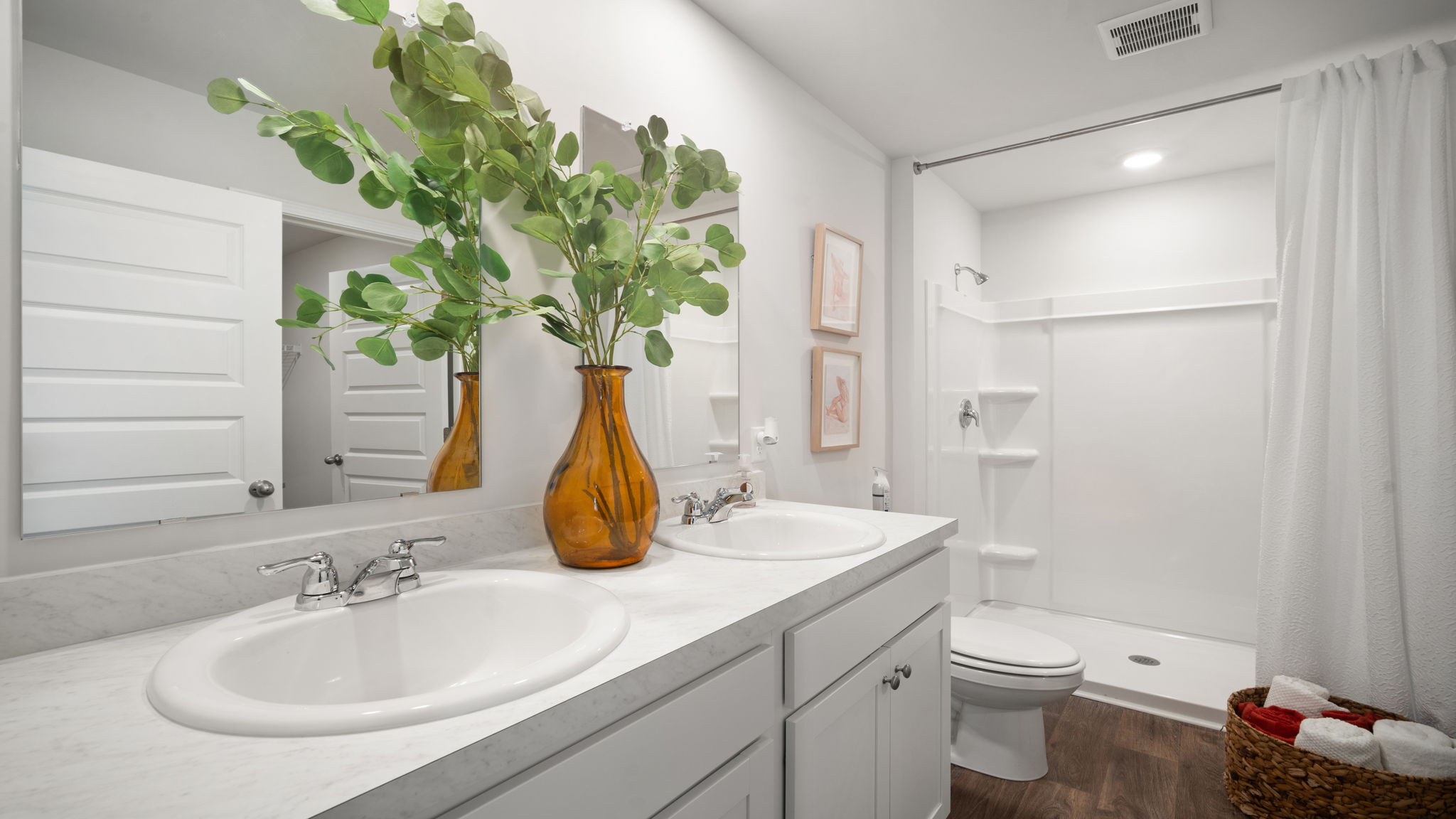 Primary bathroom in Lewis floorplan with functional layout and convenient access to walk-in closet
