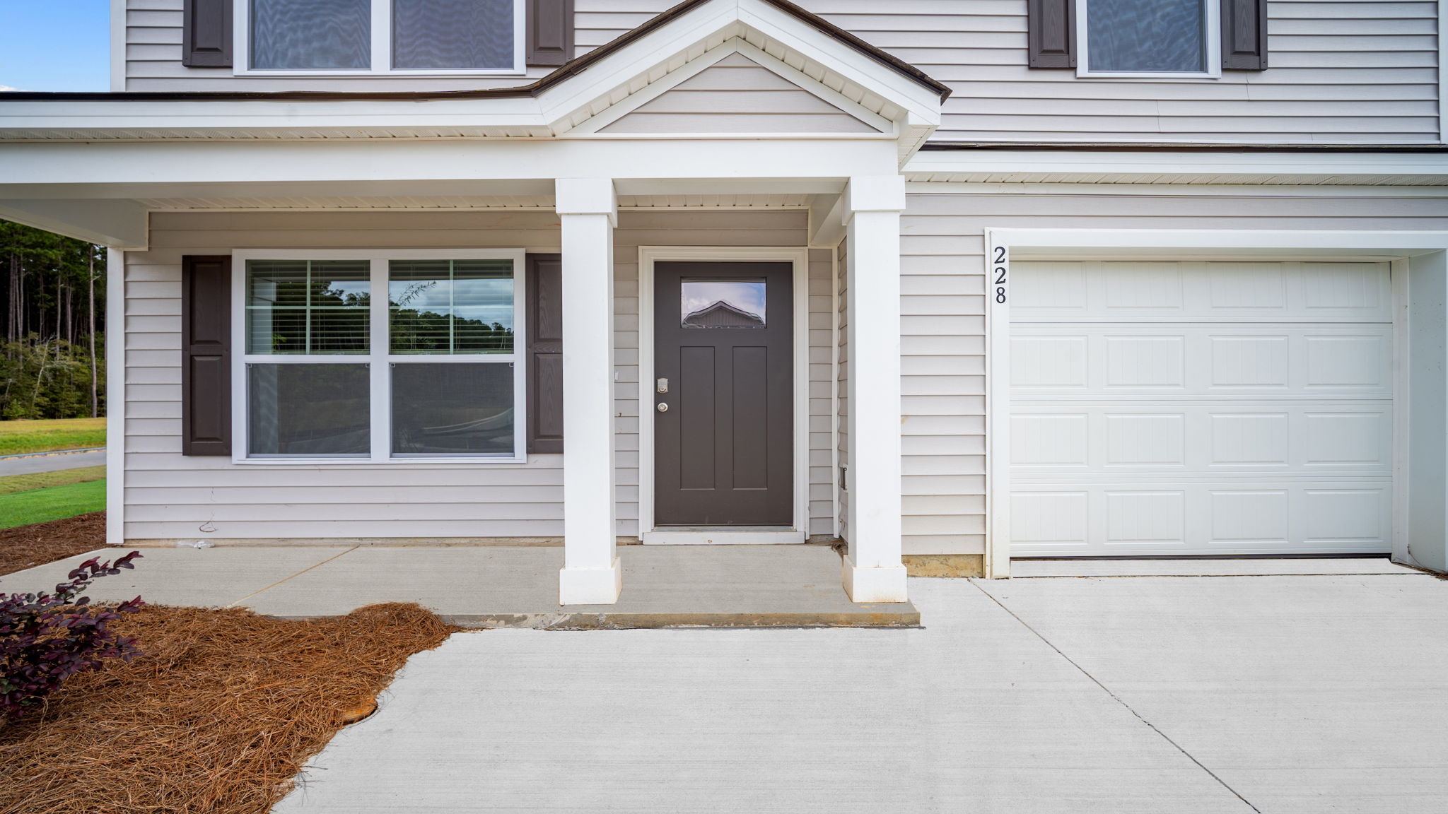 Front exterior view of covered porch