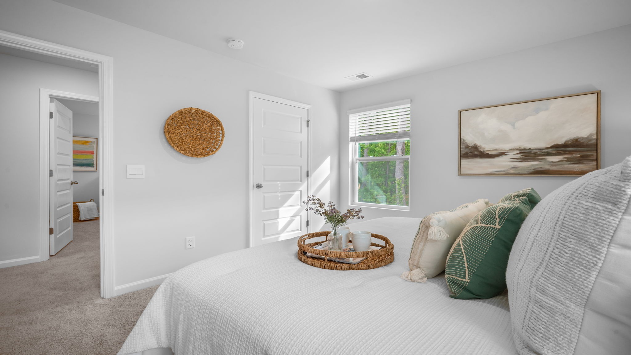 Spacious primary suite in the Hartsville floorplan by D.R. Horton in Rice Hope offering comfortable layout and private retreat feel