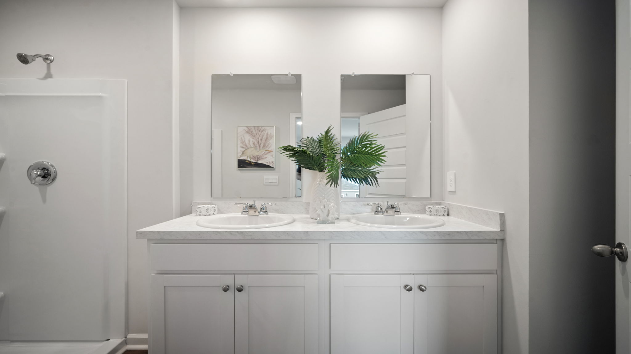 Primary bathroom with double vanities