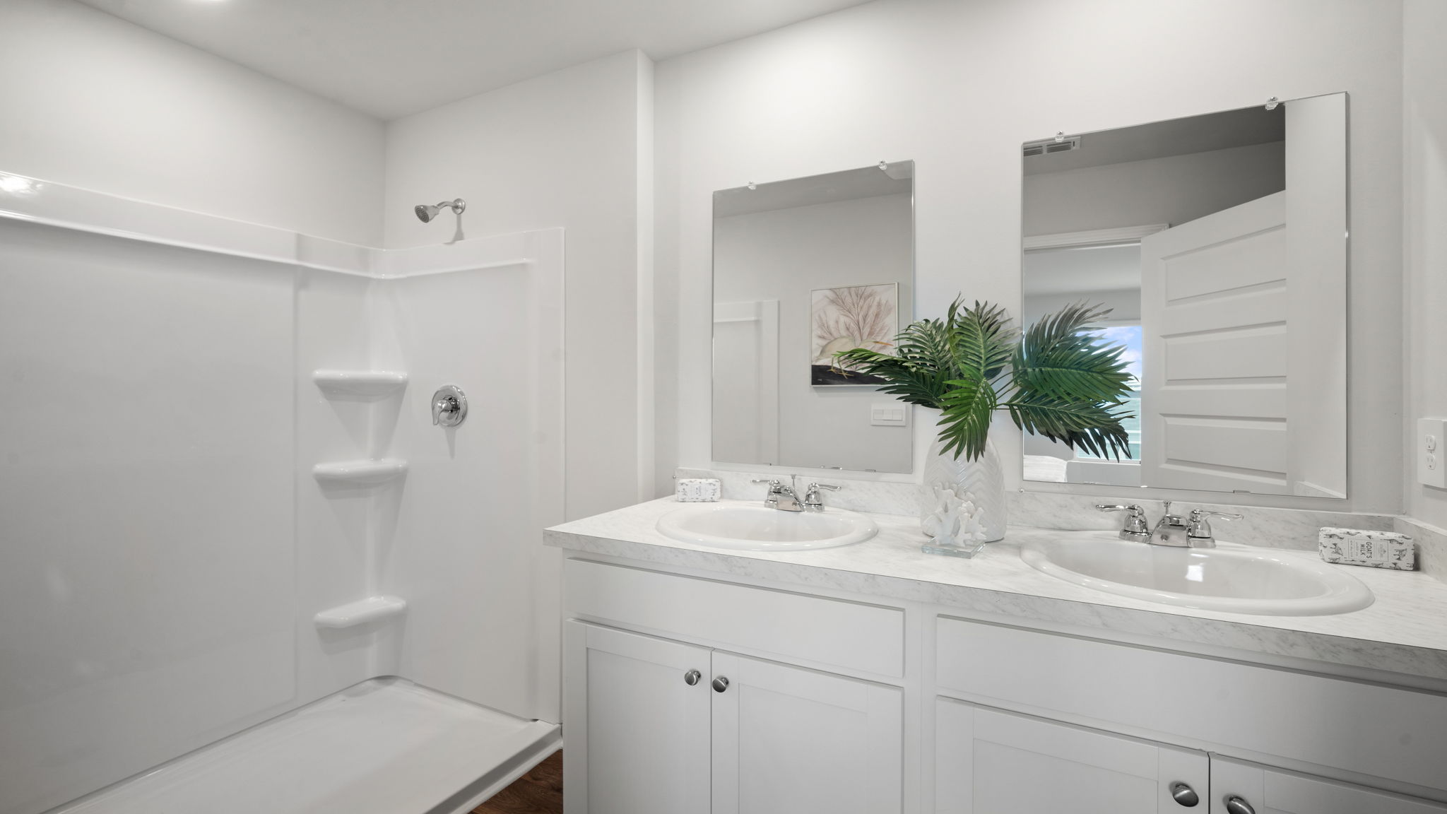 Primary bathroom with double vanities