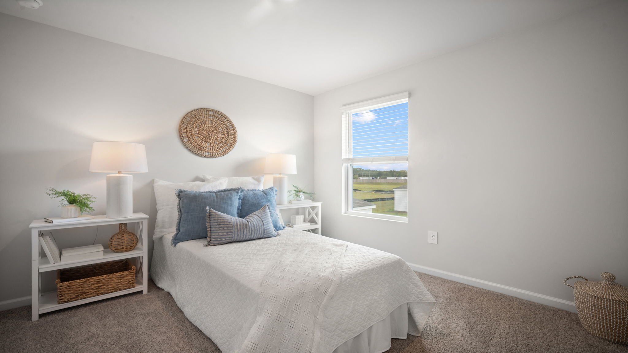 Guest bedroom decorated with a bed and a side table
