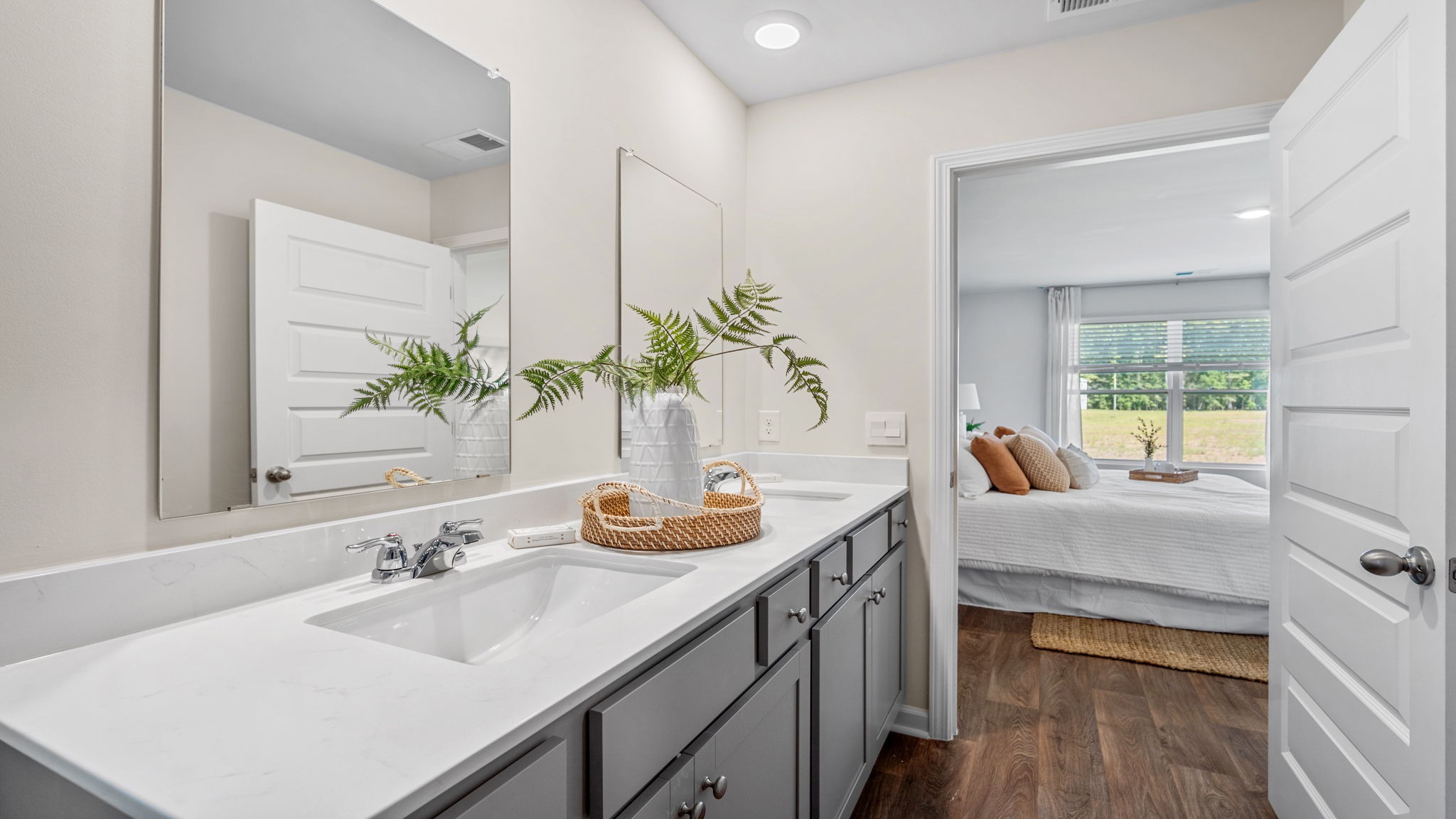 Elegant owner's bath with spacious countertops, contemporary fixtures, and a relaxing retreat feel.