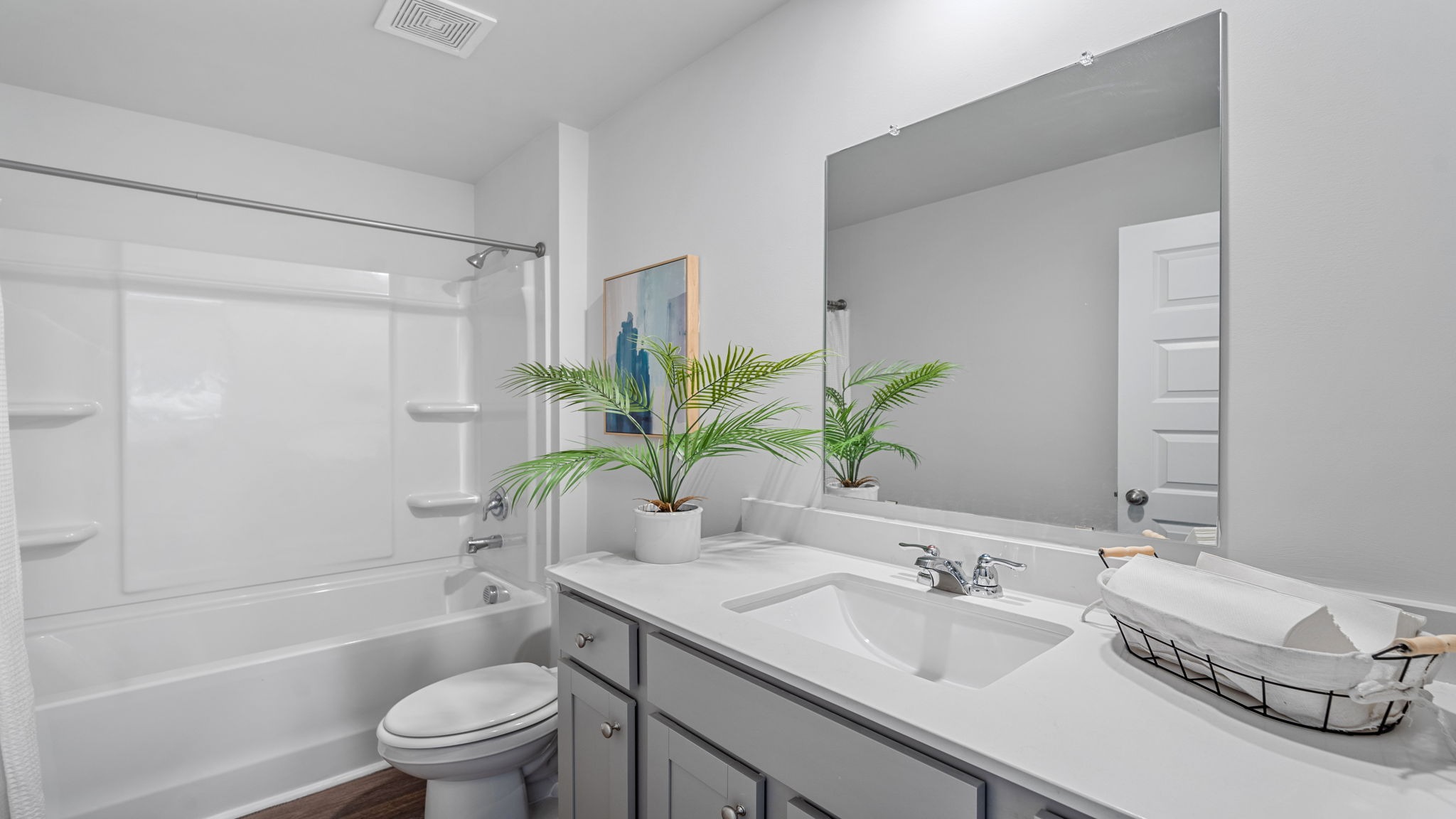 Comfortable guest bedroom in the Kerry floor plan featuring generous closet space, natural light, and flexible living options.
