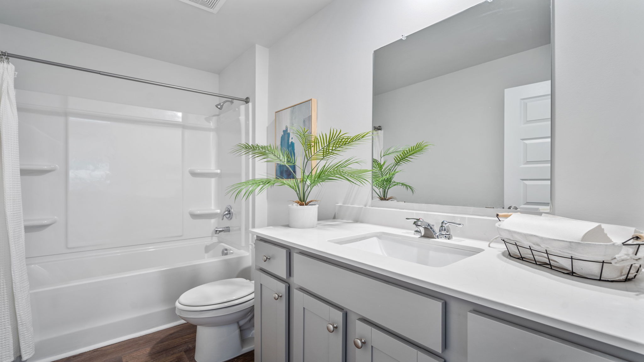 Bright secondary bedroom perfect for family, guests, or a personalized home office setup.