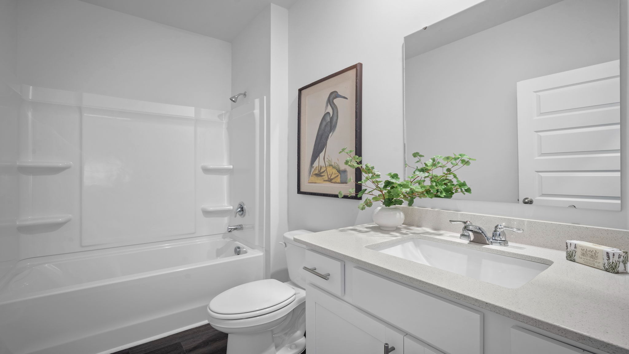 Guest bathroom with a tub shower