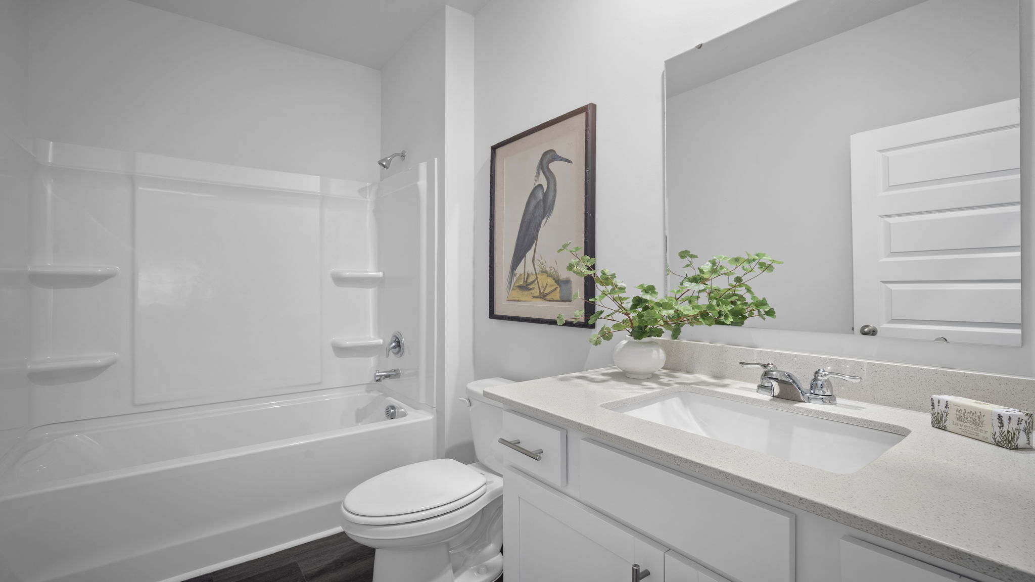 Guest bathroom with a tub shower