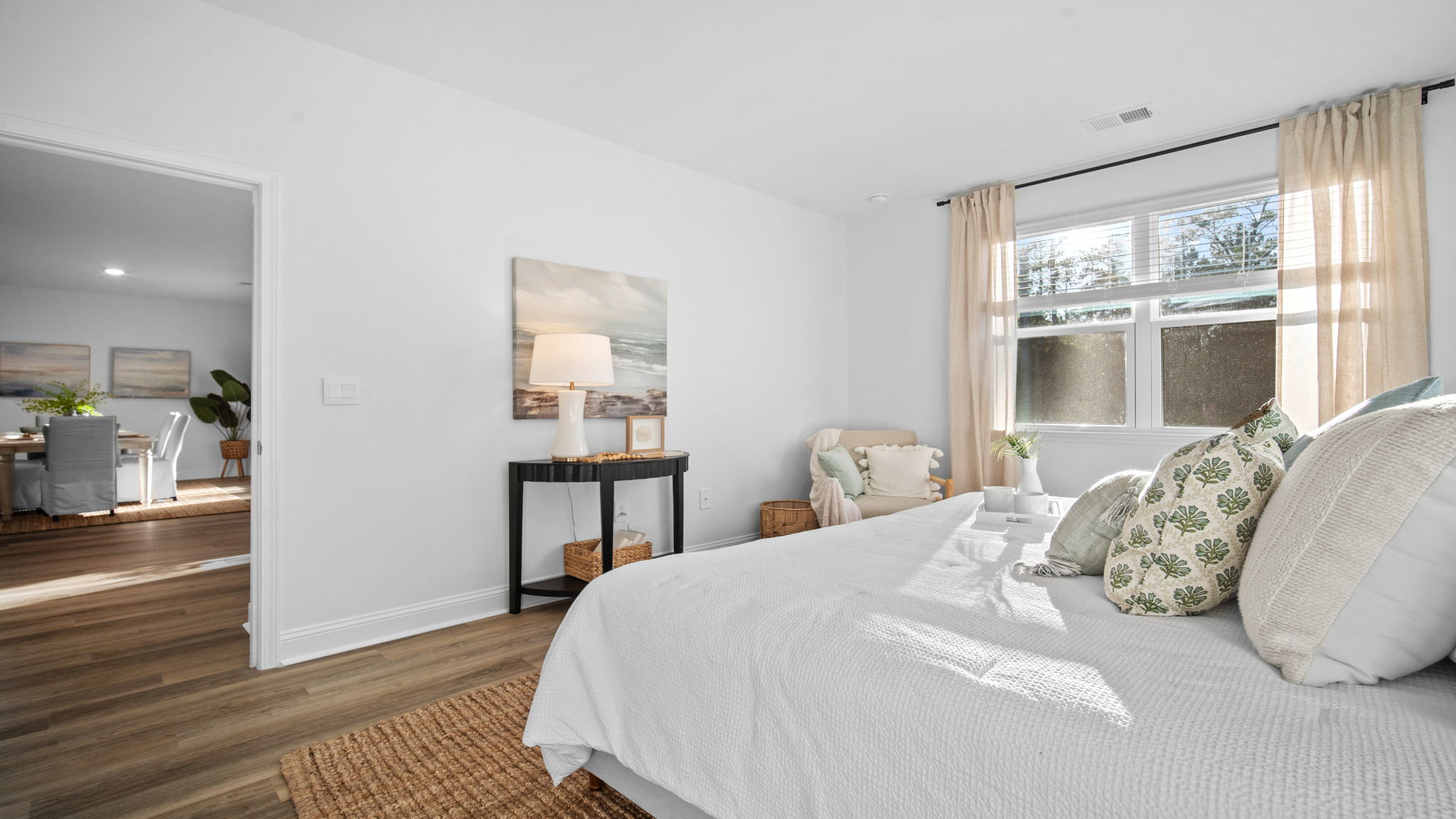 Owner's suite in the Cali home at Rice Hope offering privacy, comfort, and convenient access to the ensuite bath.