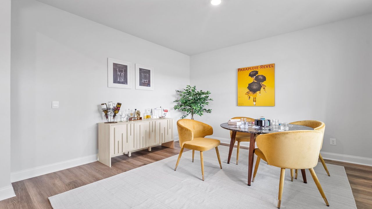 Flex room decorated with a card table and chairs