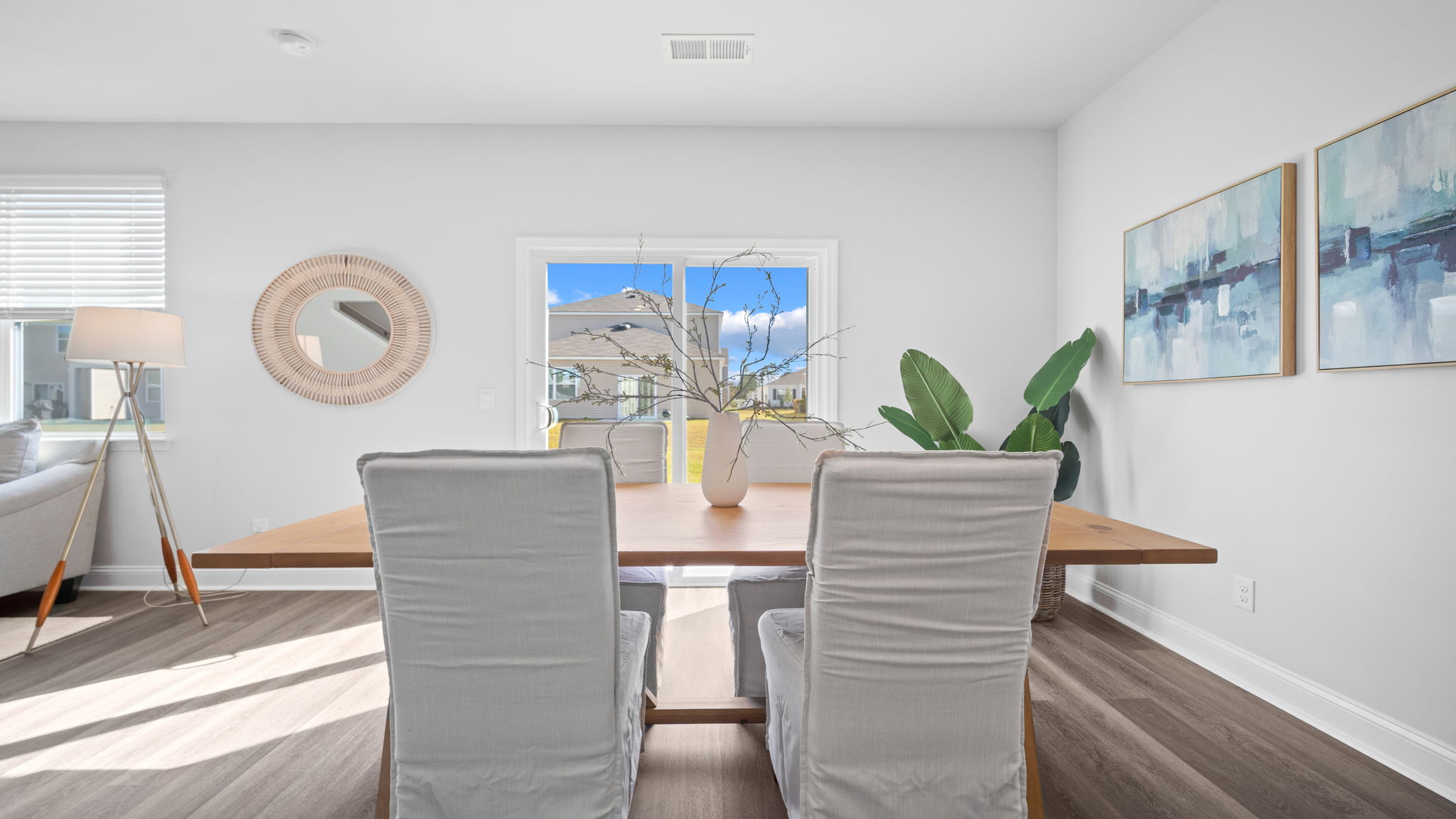 Dining area with the kitchen and living area adjacent.