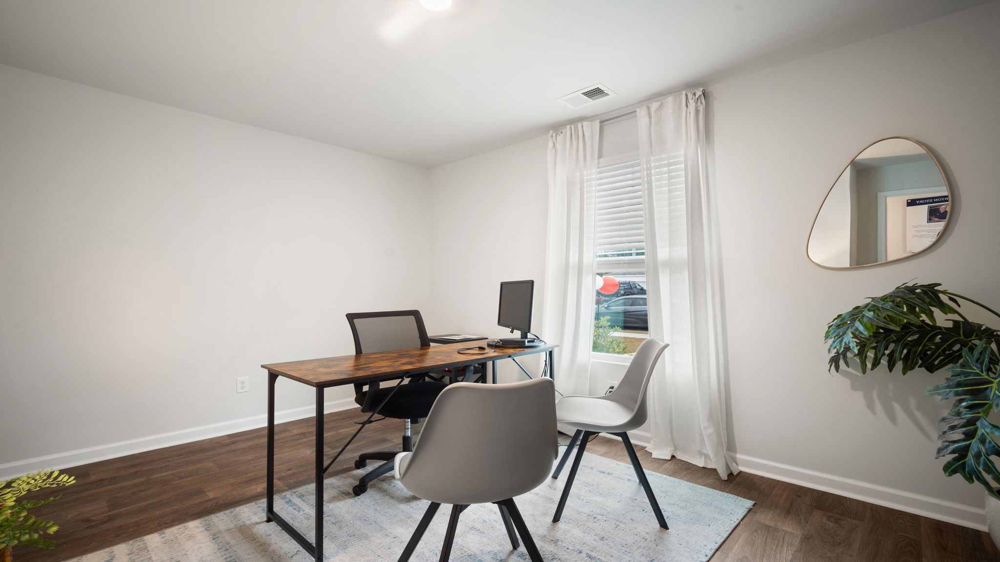 Guest bedroom decorated as an office