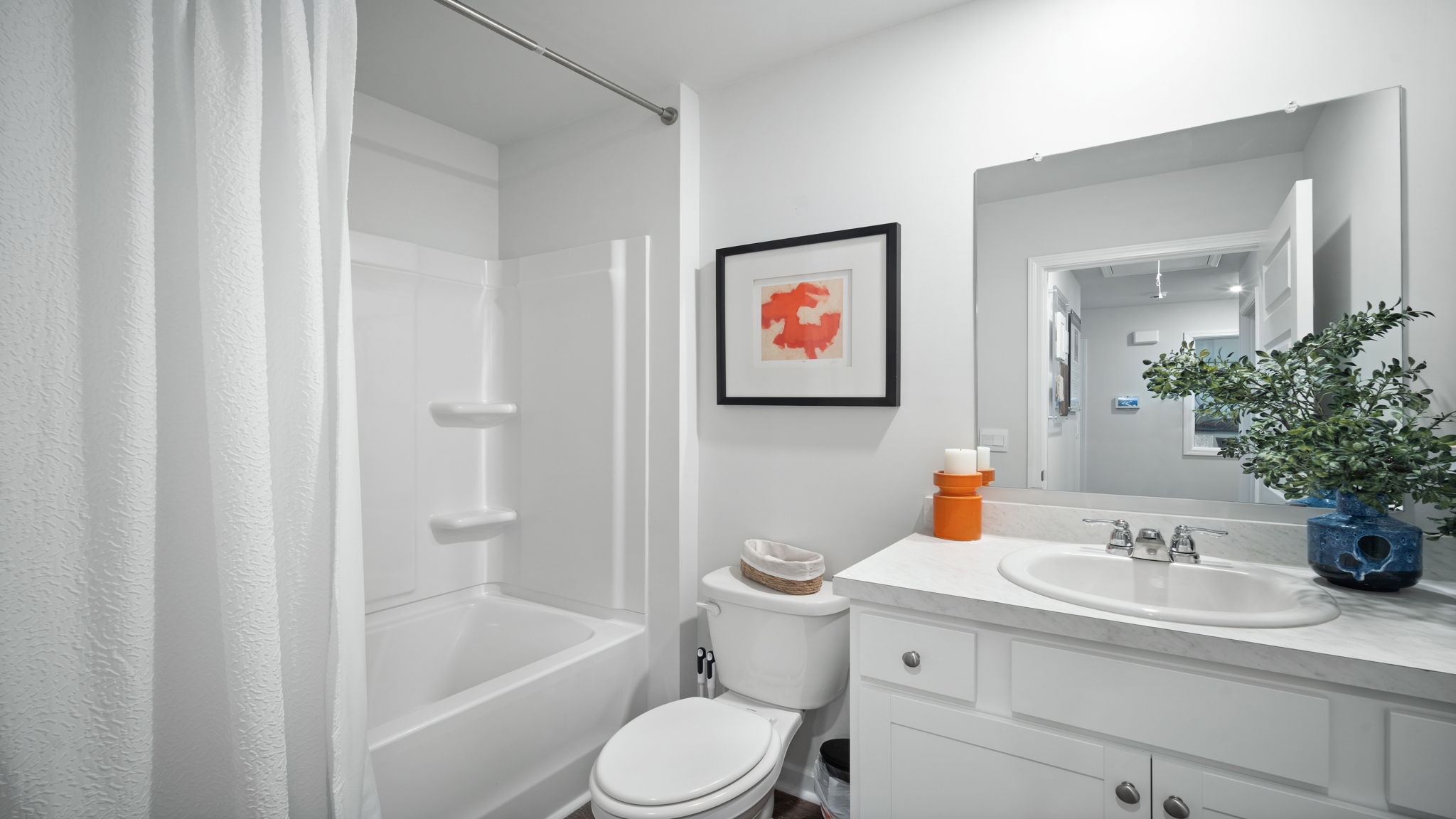 Guest bathroom with a tub shower