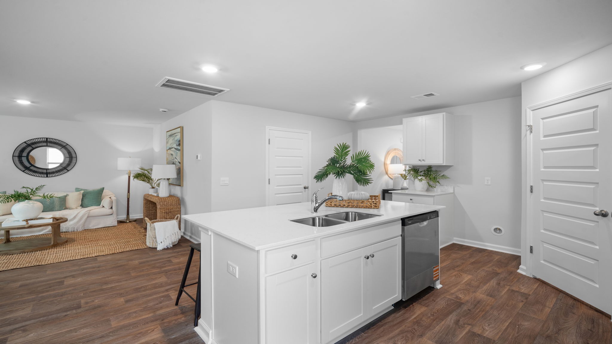 Kitchen island with a stainless dishwasher
