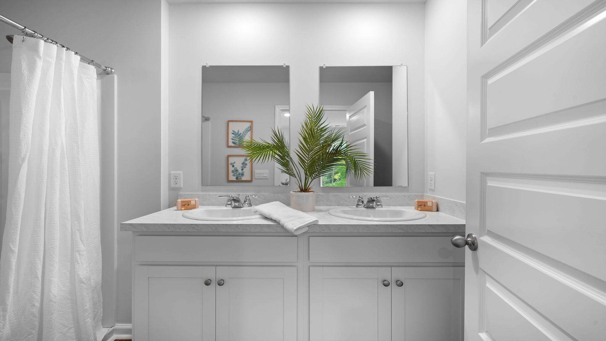 Primary bathroom with double vanities