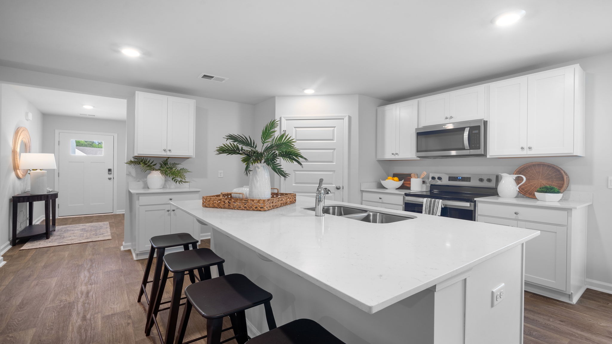 Kitchen island view into the home